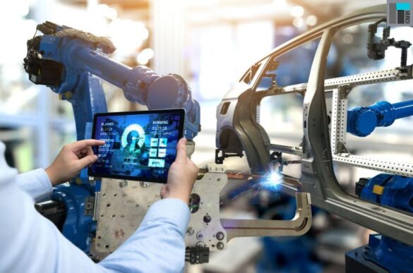 A Man Using A Tablet To Operate A Machine I Itmunch