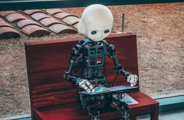 An Ai Robot Typing Something On The Laptop