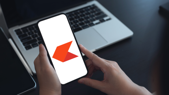 Person Holding A Smartphone With Zerodha Kite App Logo On The Screen