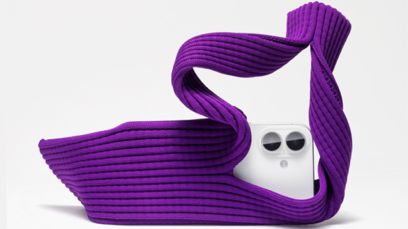 Apple X Issey Miyake Iphone Pocket In Purple Holding An Iphone